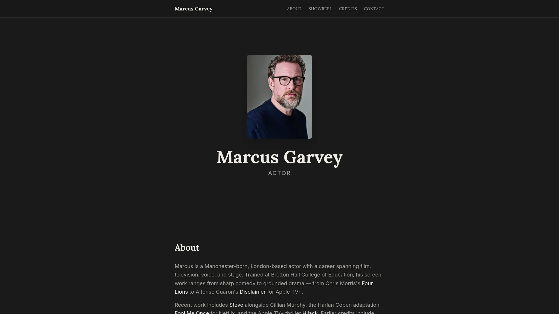 The Marcus Garvey home page: a headshot above his name, set on a near-black ground.